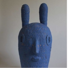 Blue ceramic head sculpture