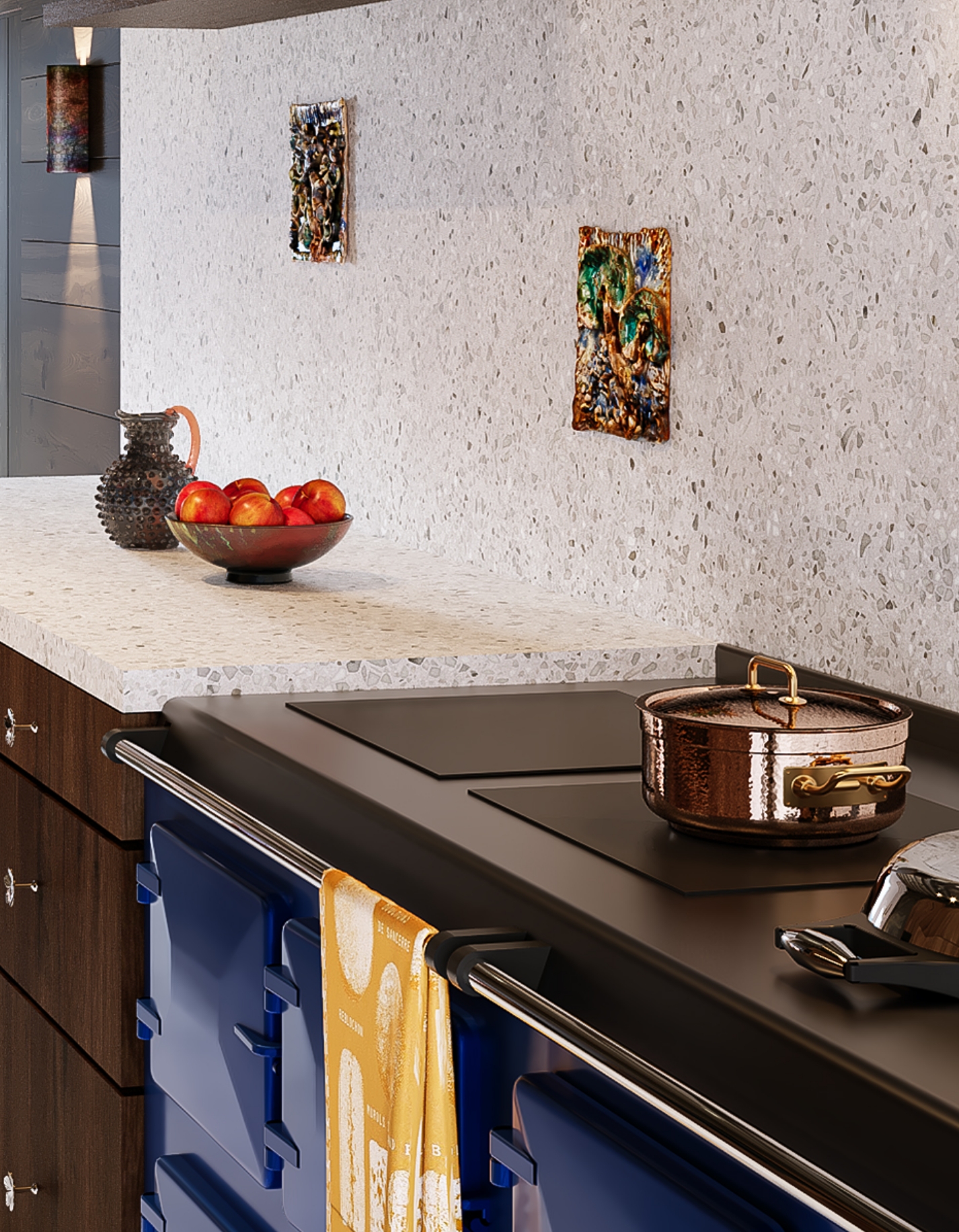 Luxury kitchen with a stoneware worktop and decorative bronze details