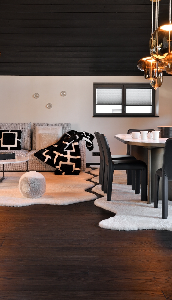 Dining area and living room of a contemporary chalet
