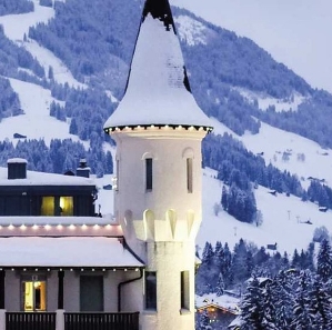 Luxury castle-style chalet under snow