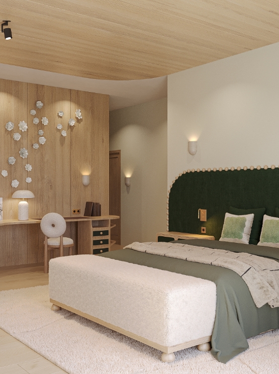 Chambre élégante avec tête de lit capitonnée verte et détails floraux muraux