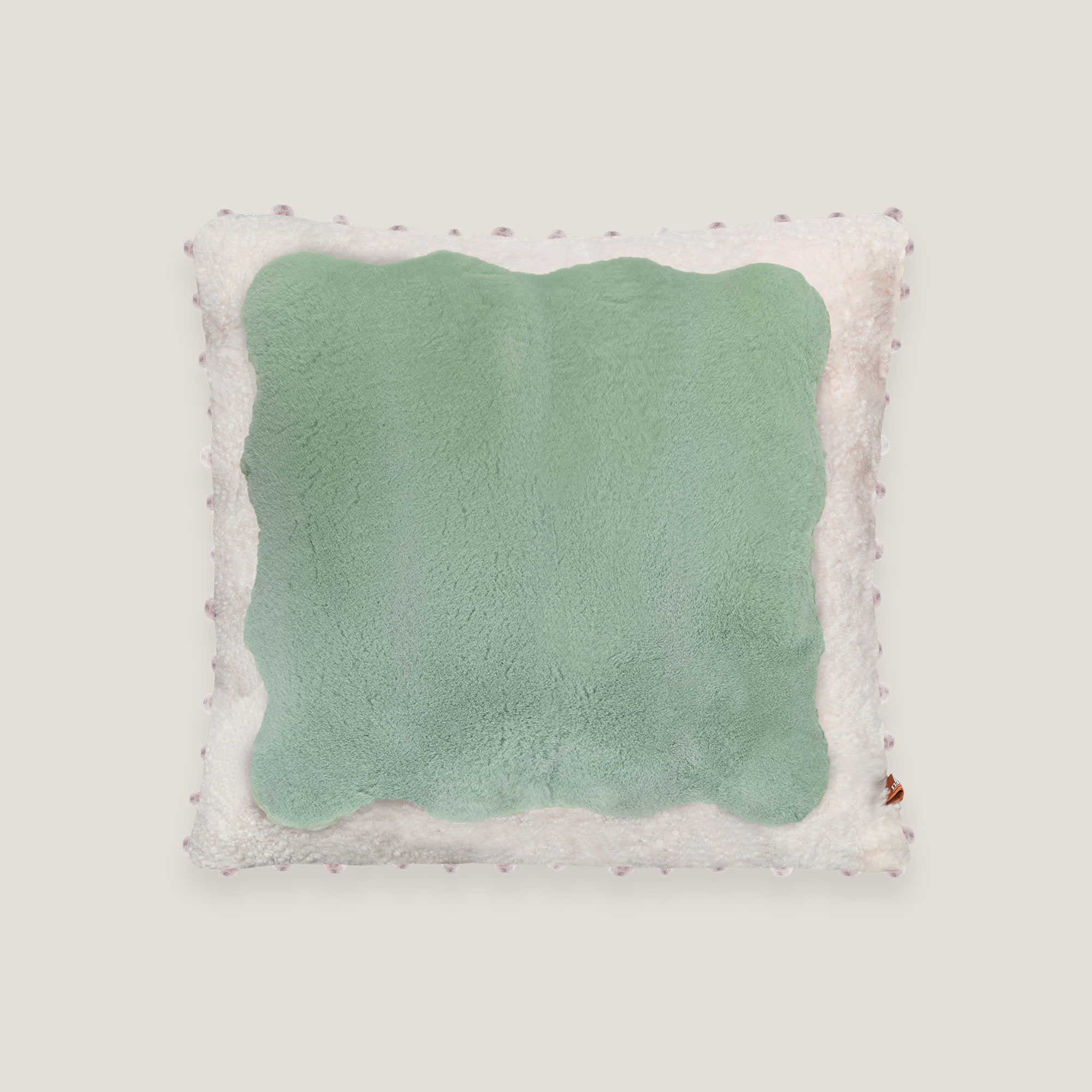 Coussin the Fairy Vert en peau lainée