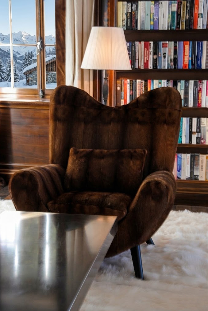 Detail of an Ambassador armchair by Jean Royère upholstered in golden mink by Norki Workshops